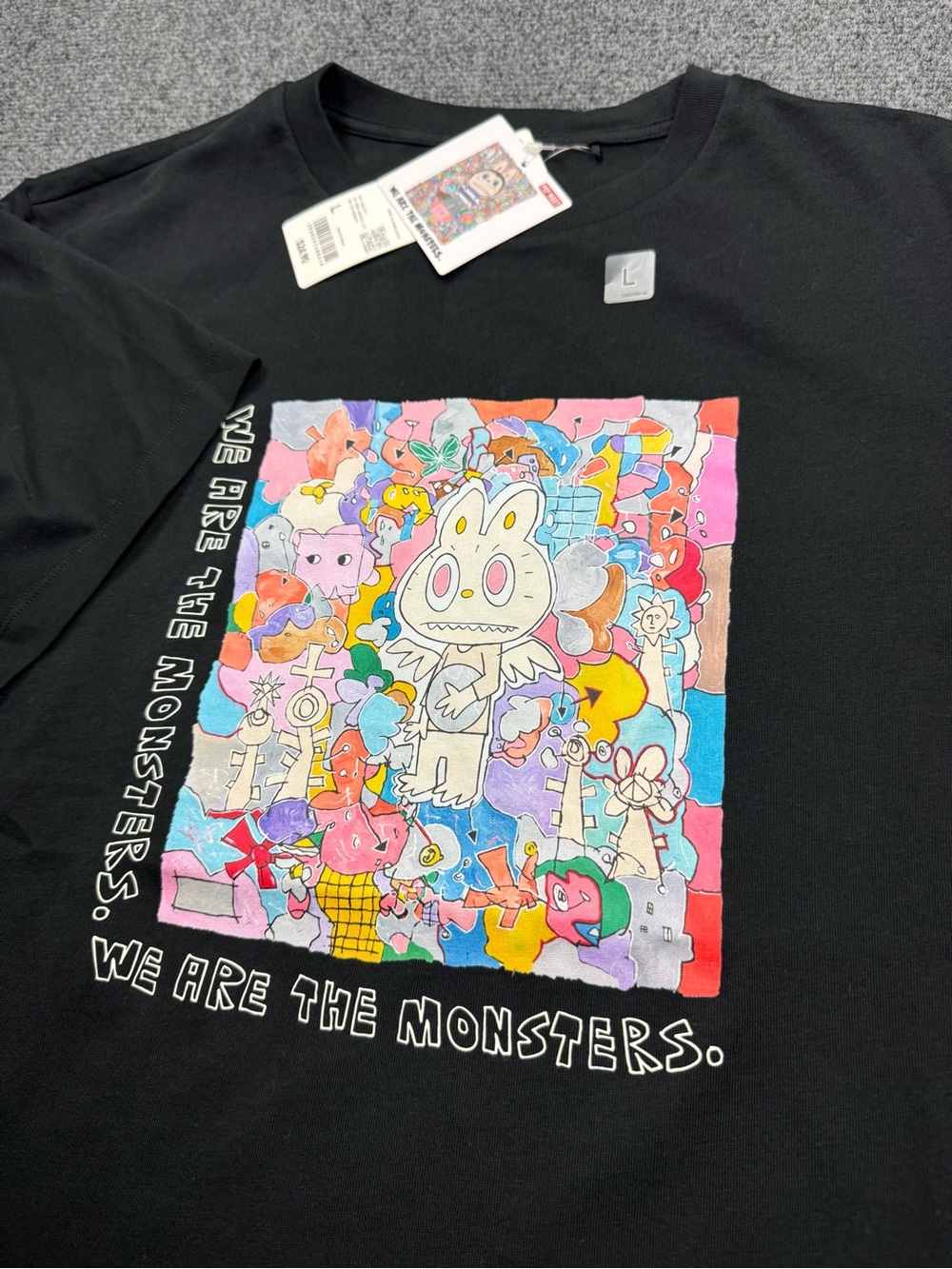 Uniqlo Black Tee with Colorful Cartoon Monster Panel
